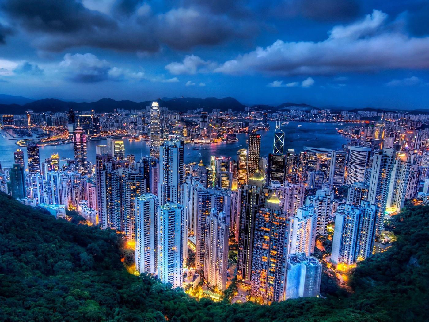 Hong Kong skyline over Victoria Harbour at dusk